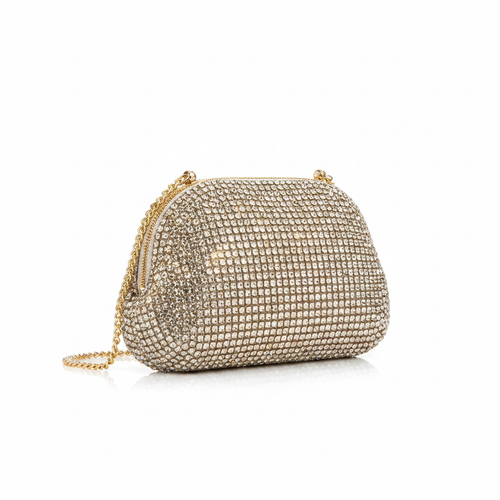 Crystal rhinestone evening clutch bag in champagne gold on white background