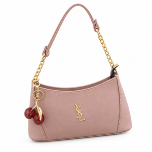Pink handbag on a white studio background