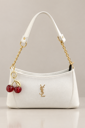 White handbag in a minimal studio setting